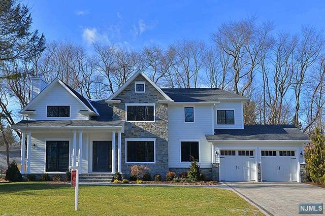 Fabulous Center Hall Colonial new construction situated on the East Hill of Demarest built by well-known local builder about 5,300 Sq Ft livable space including huge finished basement, 2 story EF open to formal living room and formal dining room leading to huge MEIK with top of the line appliances, oversized island open to spacious family room overlooking private fully fenced yard, Full bth and Bedroom or office on the first floor. Second floor consisting of master bedroom suite with his and hers walk-in closets, 1 bed room suite, 2 BR with shared bathroom and Laundry/Linen Closet. Lower level consists of guest bedroom, full bath, huge rec room additional area for gym and or home theater, super quality throughout. Expected completion: about 3 month. Walking distance to elementary school and NYC bus.
